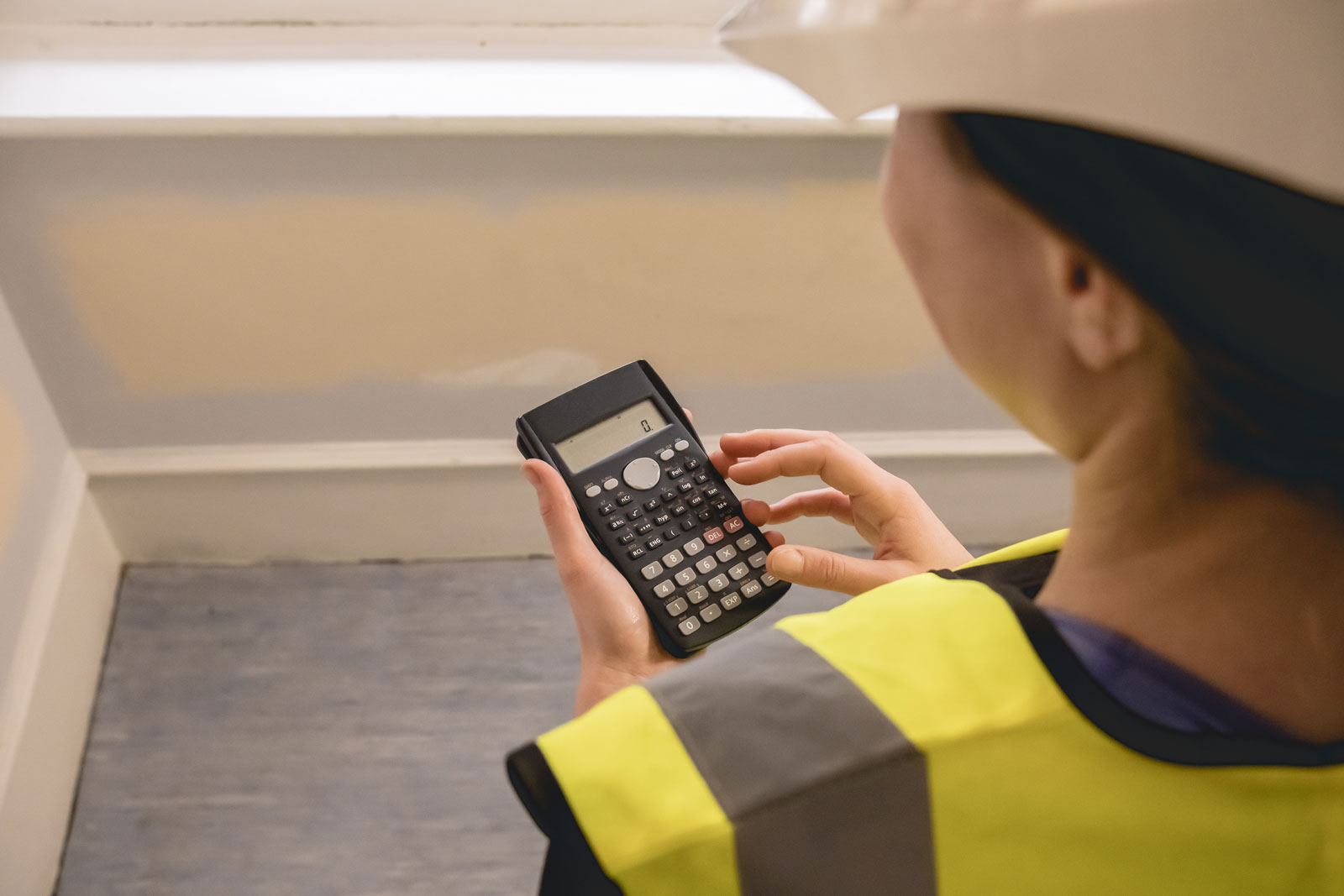 Engineer Holding Calculator