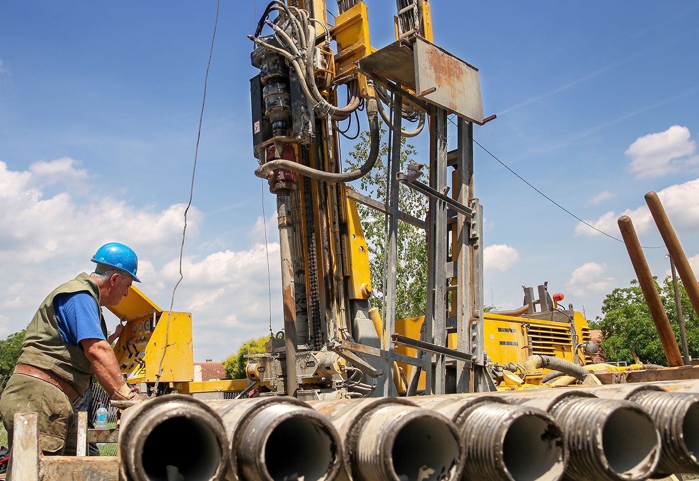 Engineer Watching Over Oil Rig Machine Operations